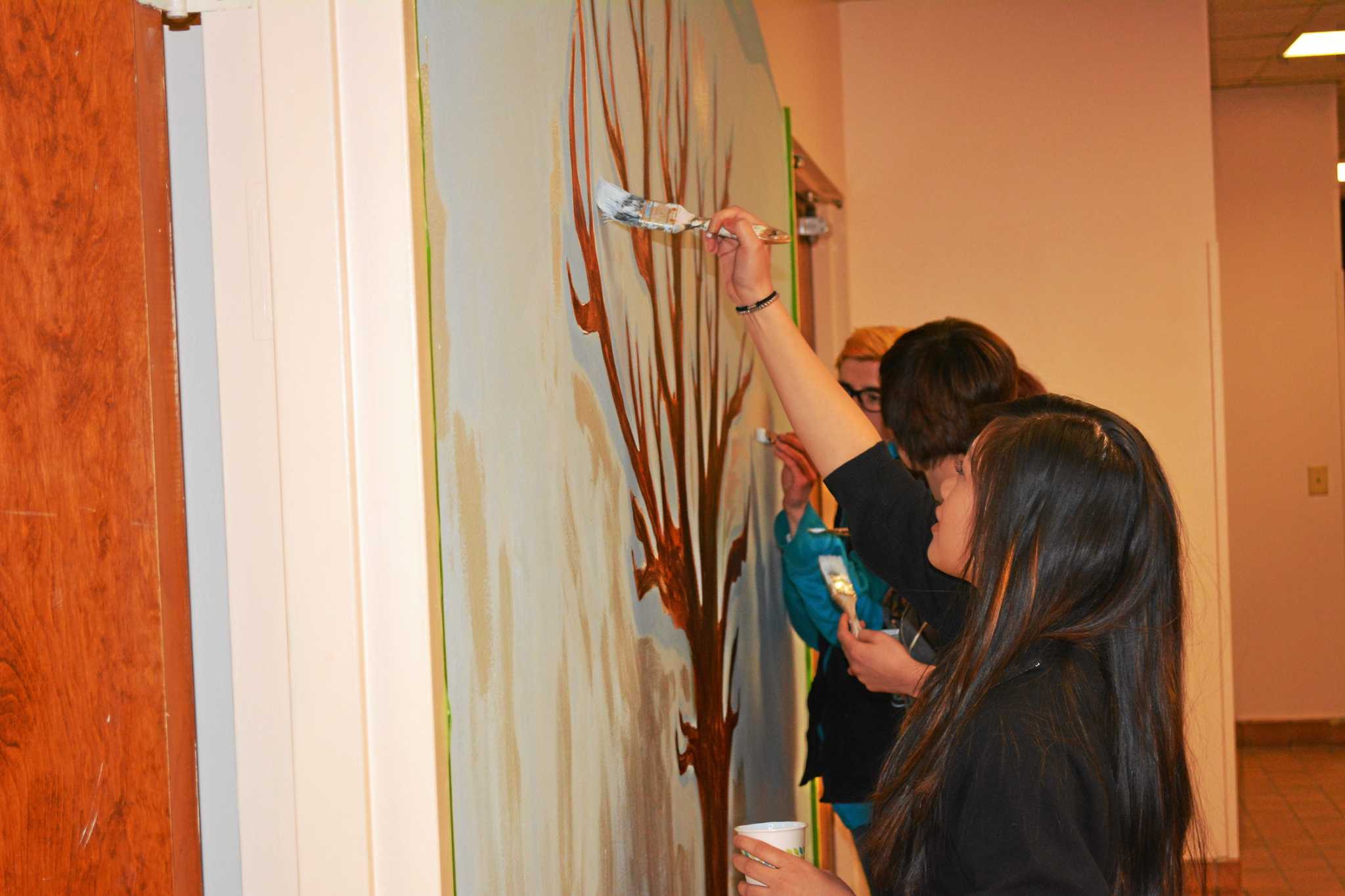 Gilbert students paint ‘Giving Tree’ in Winsted town hall
