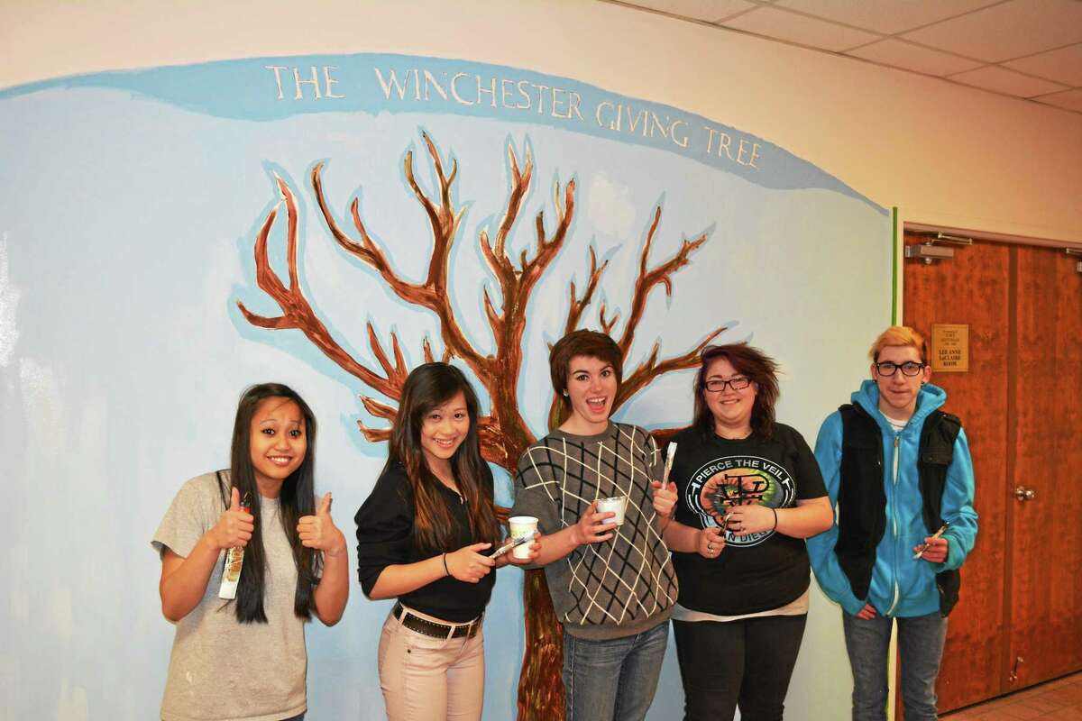 Gilbert students paint ‘Giving Tree’ in Winsted town hall