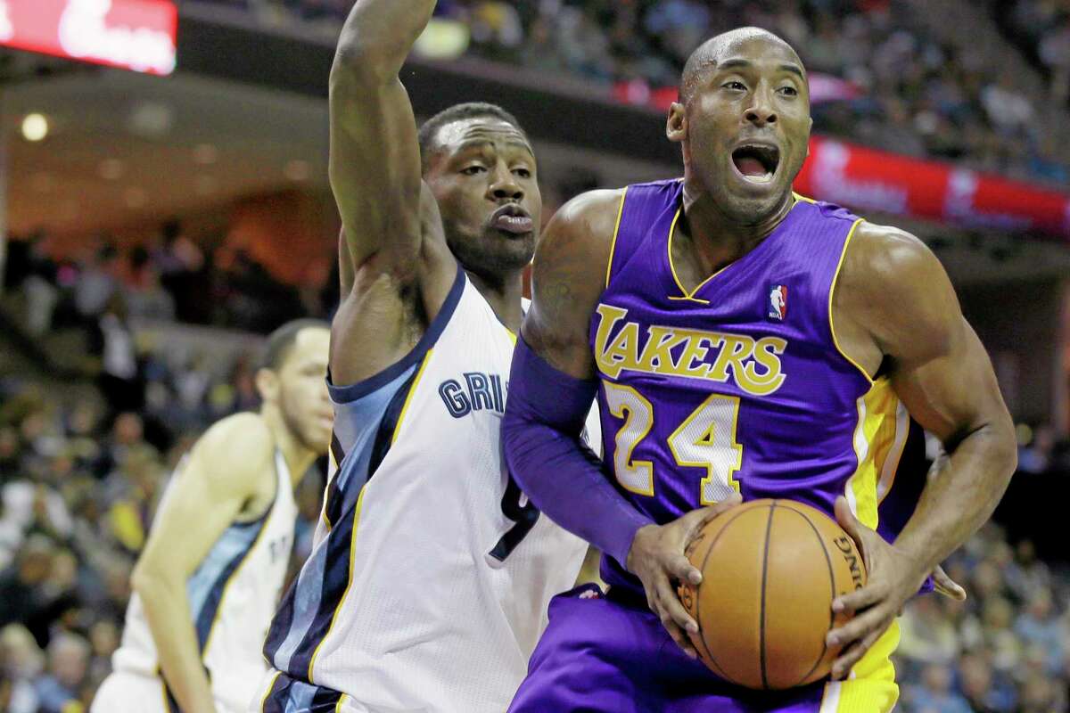 The Grizzlies’ Tony Allen defends the Los Angeles Lakers’ Kobe Bryant during Tuesday’s game in Memphis, Tenn.