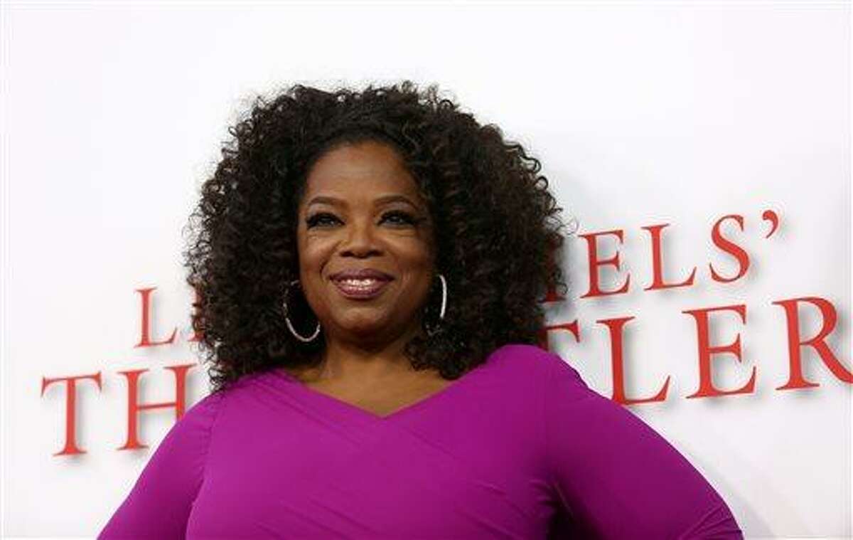 Oprah Winfrey arrives at the Los Angeles premiere of "Lee Daniels' The Butler" at the Regal Cinemas L.A. Live Stadium 14 on Monday, Aug. 12, 2013. (Photo by Matt Sayles/Invision/AP)