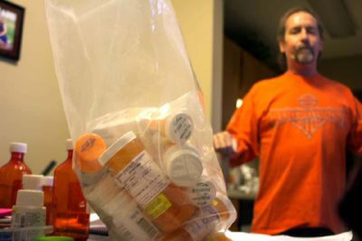 Lung transplant patient James Sawyer must take medications that cost thousands of dollars a month as a result of work-related illness.