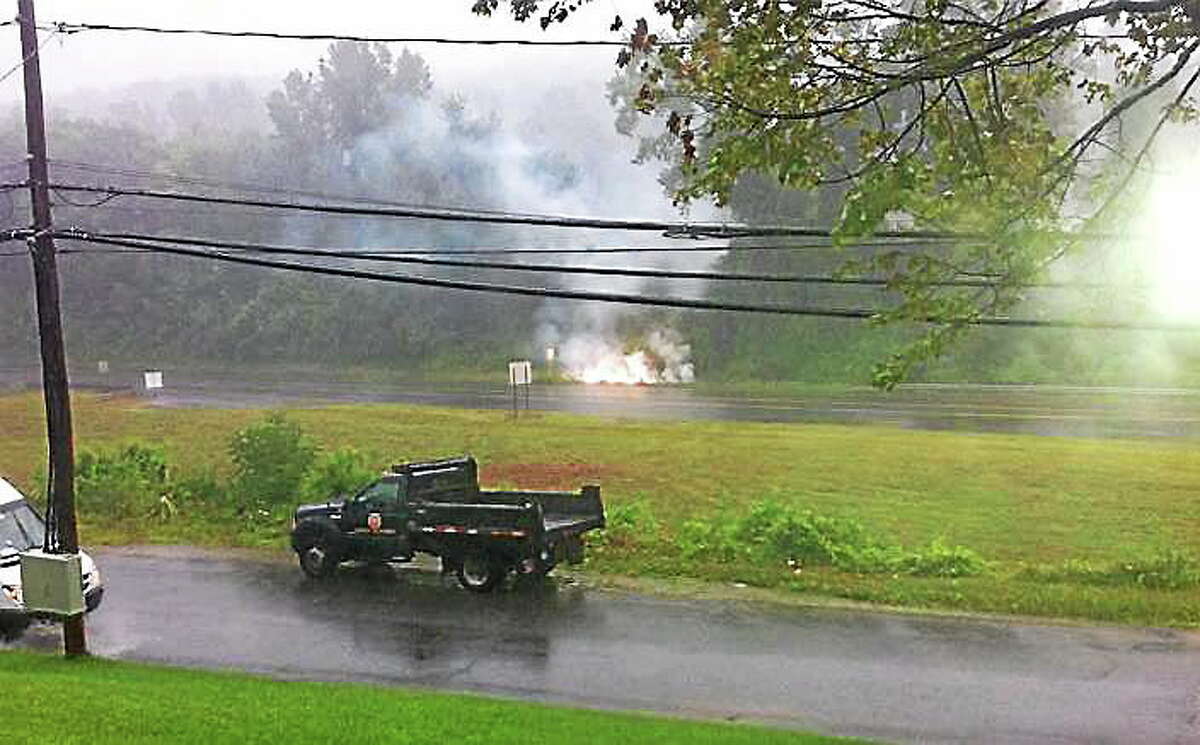 A downed live electric wire caused a fire which shut down part of Route 44 in Winsted late Wednesday morning and left over 600 Connecticut Light and Power customers without electricity,