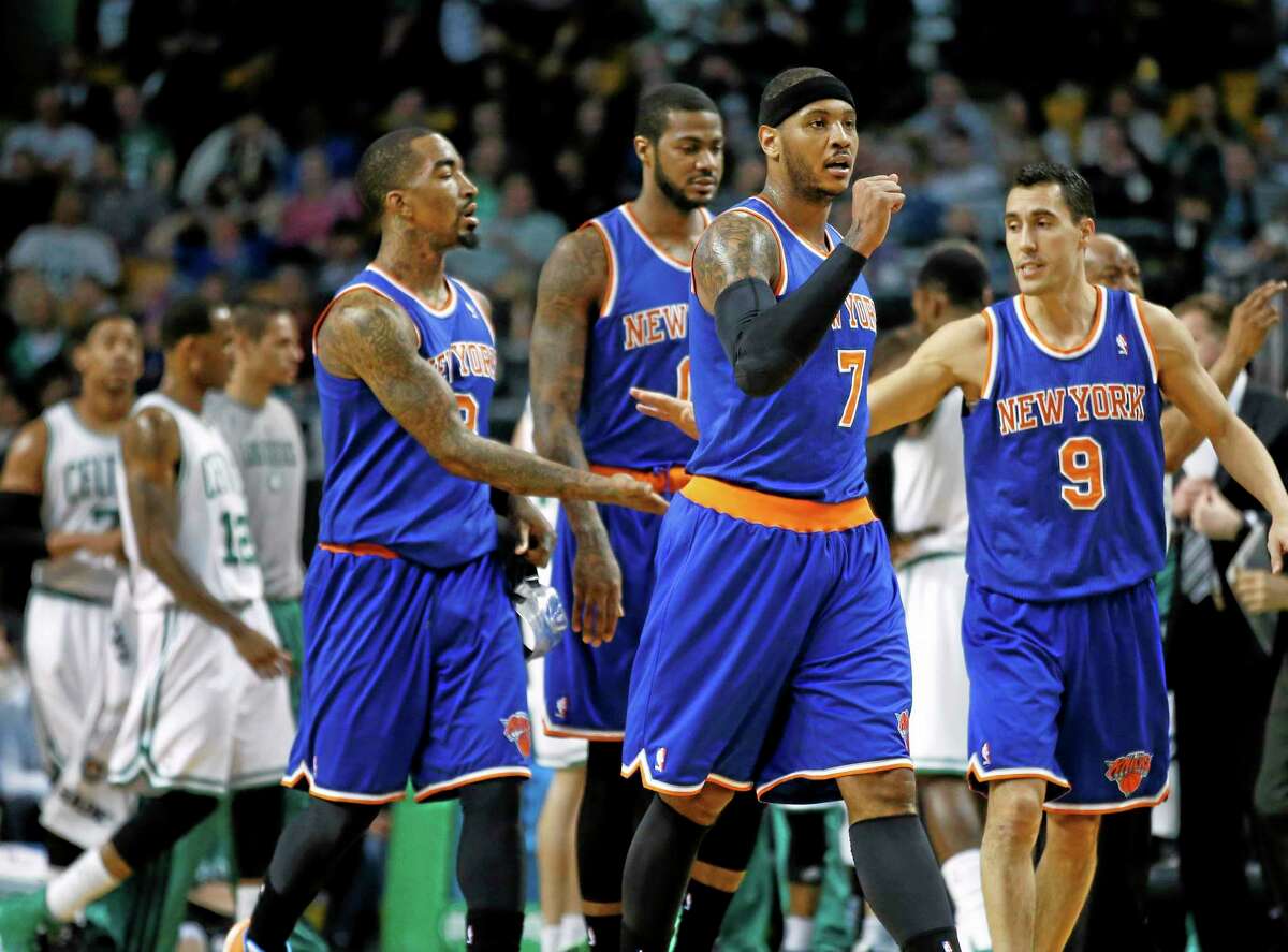 Carmelo Anthony and the New York Knicks crushed the Celtics 116-92 in Boston on Wednesday.