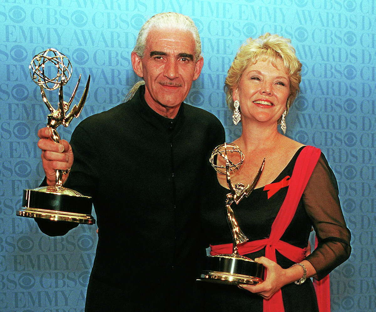 Charles Keating, left, and Erika Slezak pose with their Emmys during the 23rd Annual Daytime Emmy Awards in New York on May 22, 1996. Slezak won the Outstanding Lead Actress In a Drama Series for her role in “One Life To Live,” and Keating won Outstanding Lead Actor in a Drama Series for his role in “Another World.”