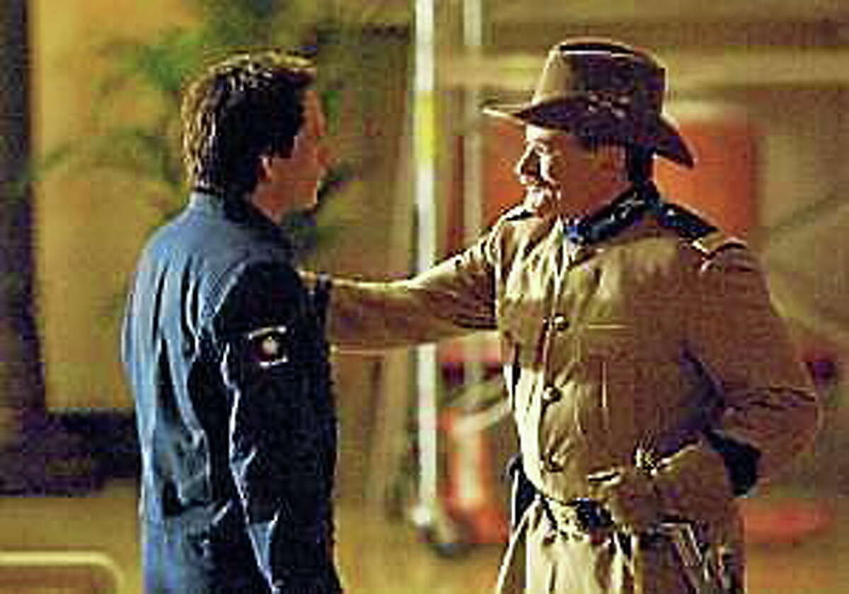 In this film publicity image, Teddy Roosevelt, portrayed by Robin Williams, right, and Larry Daley, portrayed by Ben Stiller are shown in a scene from, “Night at the Museum: Battle of the Smithsonian.”