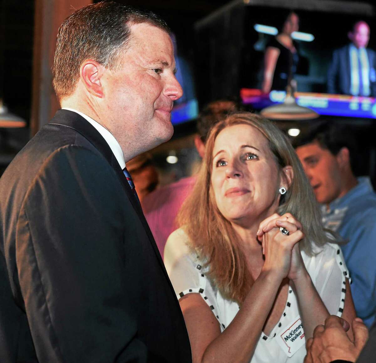 State Sen. John McKinney stops to talk with supporter Jennifer Verraneault after conceding the Republican primary to Tom Foley Tuesday night. McKinney appointed Verraneault to the task force for the study of care and custody of minor children and legal disputes.