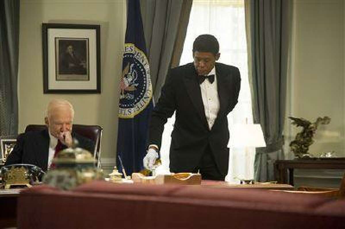 This film image released by The Weinstein Company shows Robin Williams as Dwight Eisenhower, left, and Forest Whitaker as Cecil Gaines in a scene from "Lee Daniels' The Butler." (AP Photo/The Weinstein Company, Anne Marie Fox)