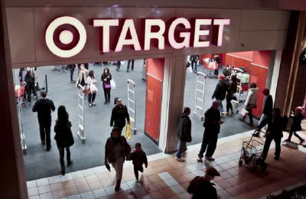 Shoppers visit Target on Saturday, Nov. 23, 2013, in New York.