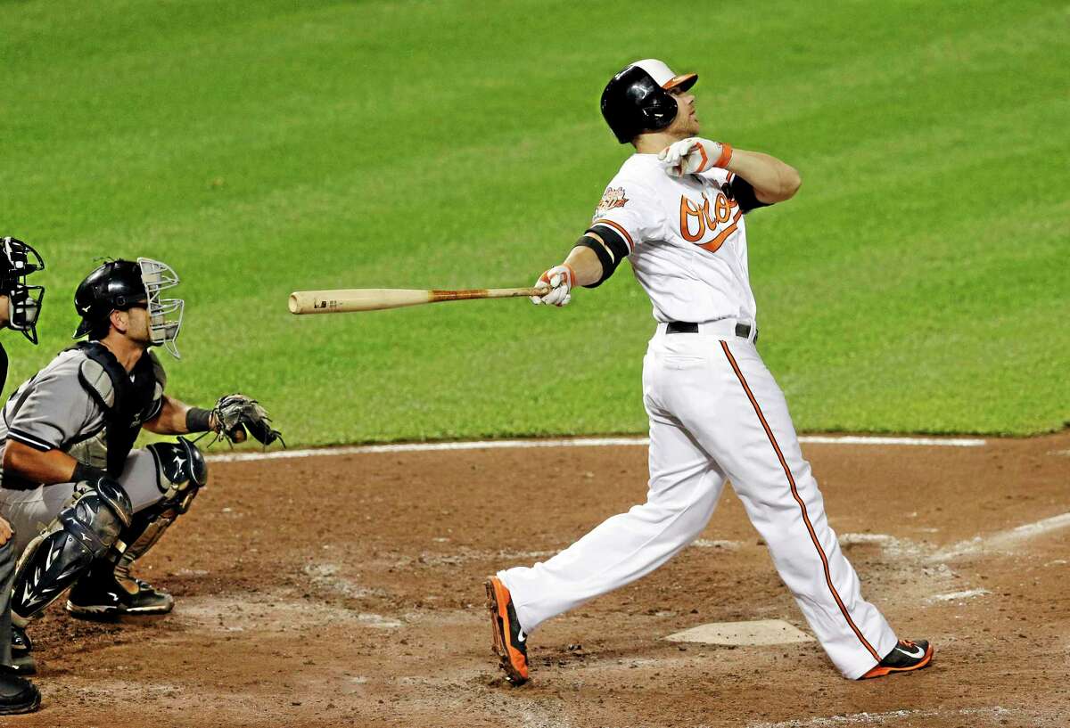 Orioles first baseman Chris Davis watches his two-run home run in the fifth inning Monday.