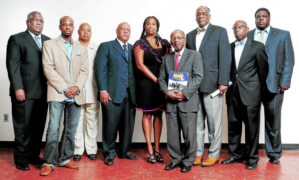 Arnold Gold — RegisterLeft to right, Ronald Davis, President of New Britain NAACP, Jason Teal, President of Meriden-Wallingford NAACP, Anthony Gaunichaux, Vice President of Middlesex County NAACP, Scot X. Esdaile, President of Connecticut State Conference of NAACP Branches , Yvette Tucker, President of Bristol NAACP, Muhammad Ansari, President of Greater Hartford NAACP, James Rawlings, Chair of the CT State Conference of Branches Health Committee, Darnell Crosland, President of Norwalk NAACP, and Greg Johnson, President of Ansonia NAACP, are photographed at the New Haven Register on 8/3/2013.