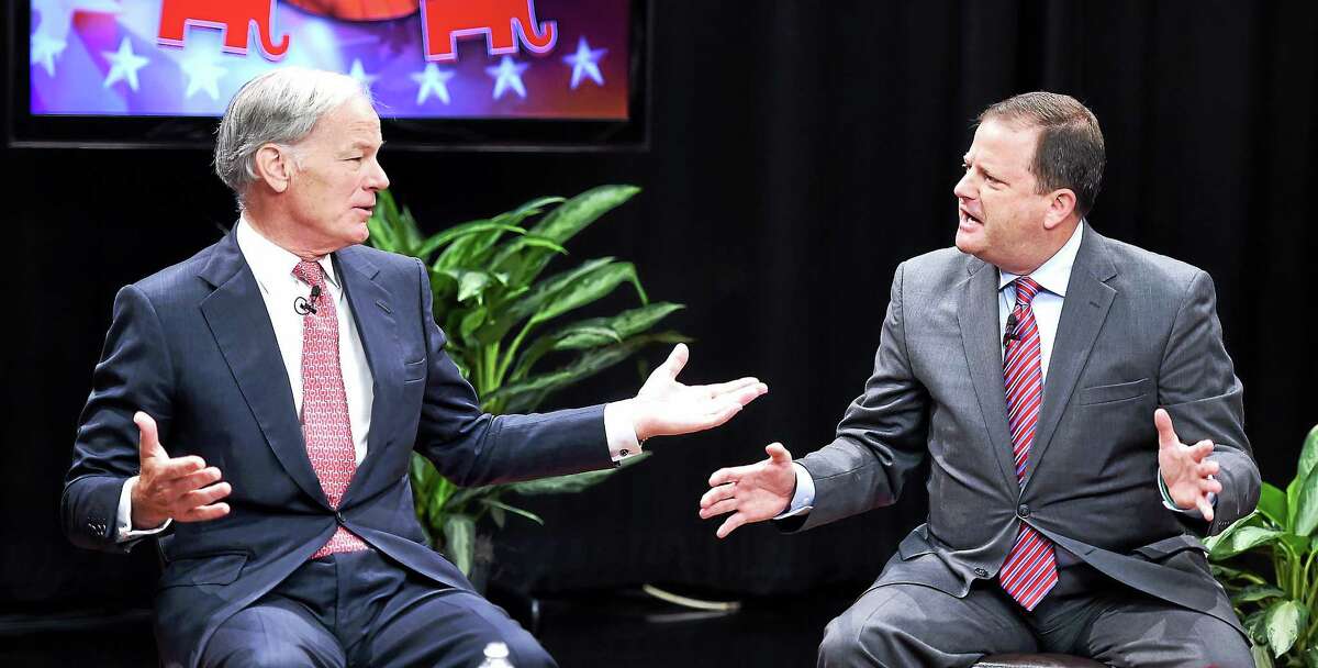 Republican gubernatorial candidates Tom Foley, left, and John McKinney spar at the Republican Primary Forum at WTNH-TV Sunday.