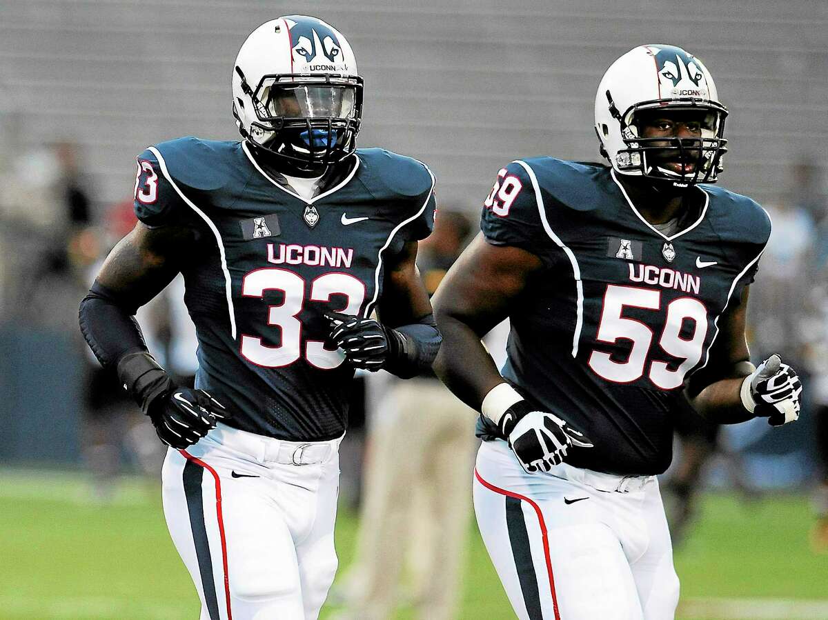 Linebacker Yawin Smallwood, left, and defensive tackle Shamar Stephen participated in UConn’s Pro Day on Tuesday in Storrs.