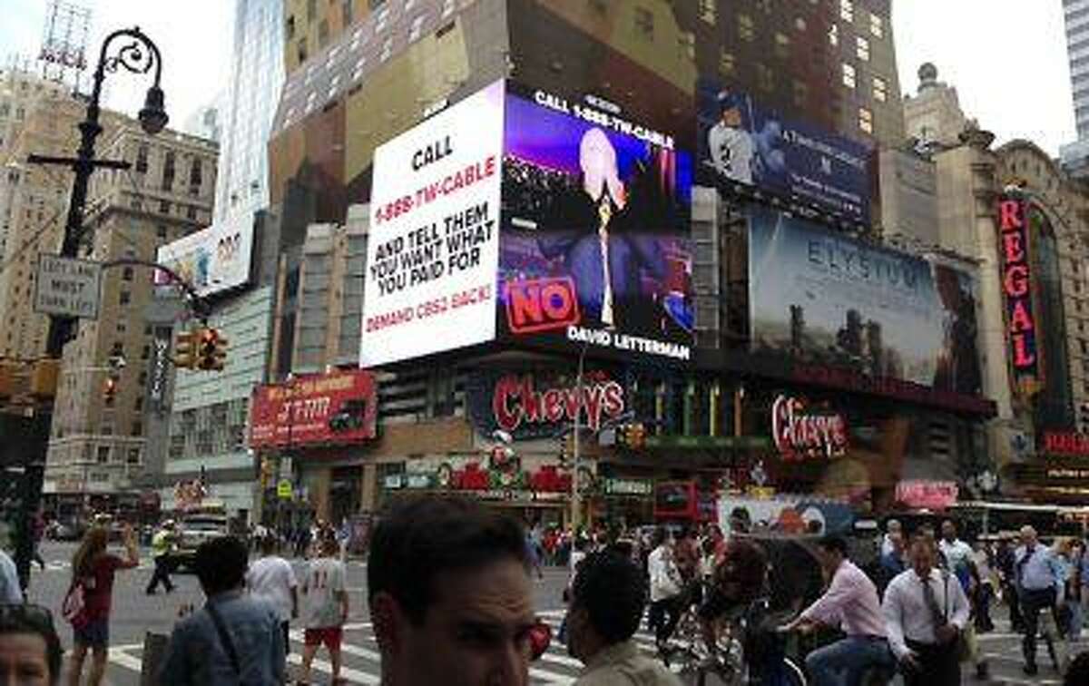 This image provided by CBS shows a CBS advertisement in Times Square in New York on Friday, Aug. 2, 2013.