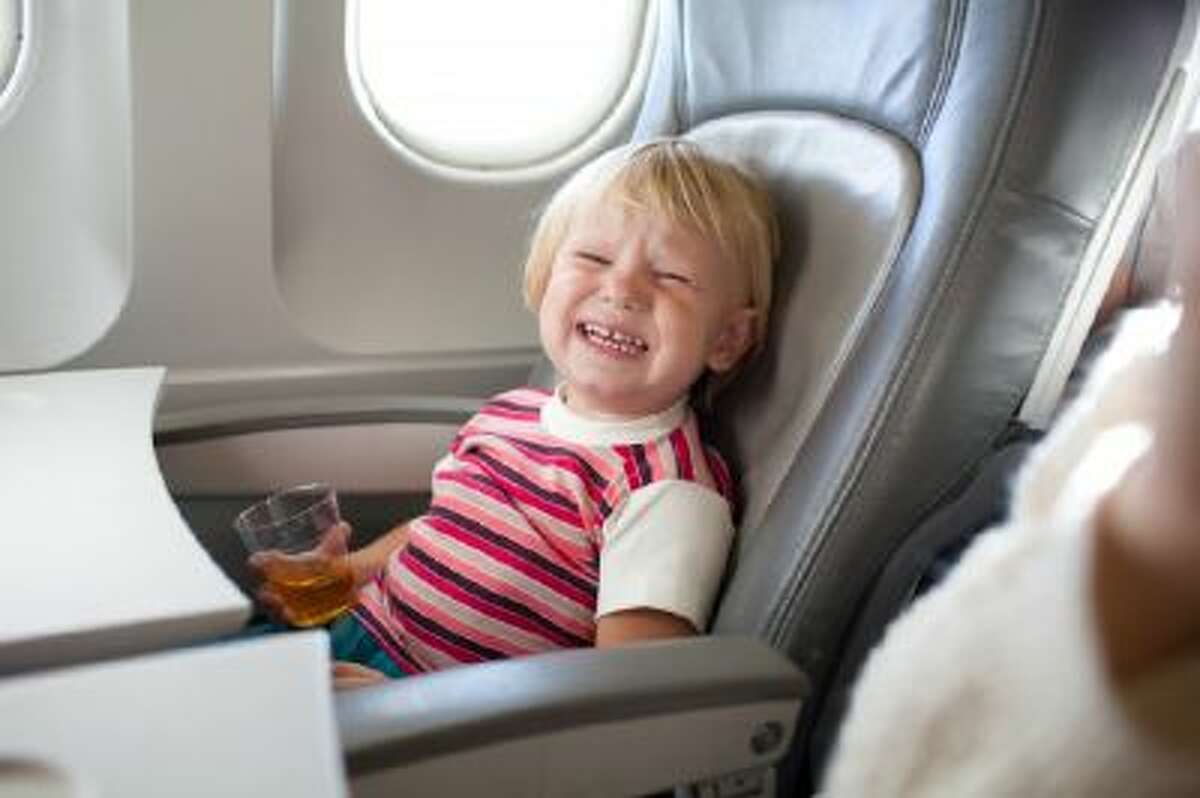 A new poll has found that inattentive parents with unruly children are the most annoying passengers.
