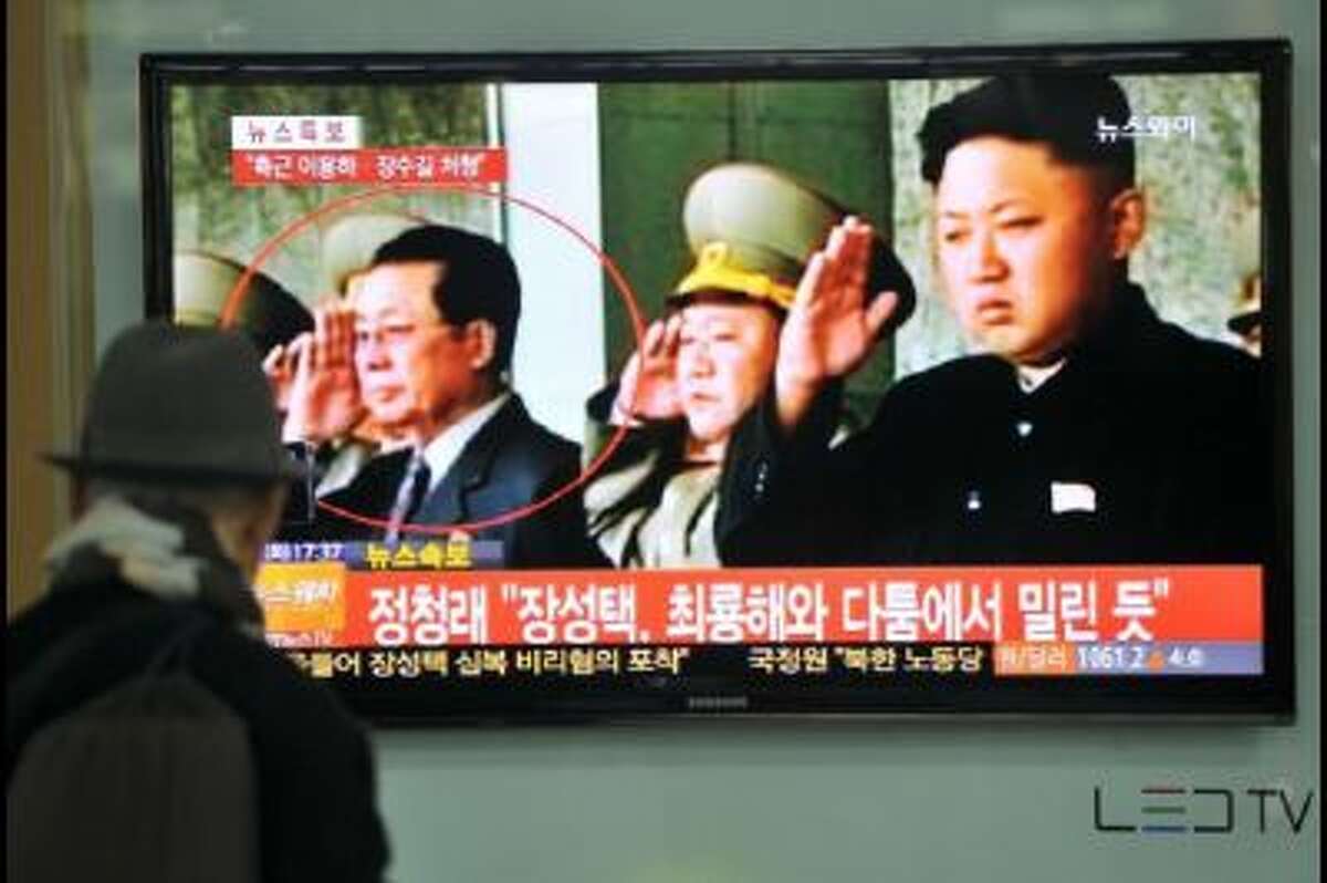 South Korean TV reports on the dismissal of Jang Song Thaek, the uncle of North Korean leader Kim Jong Un.
