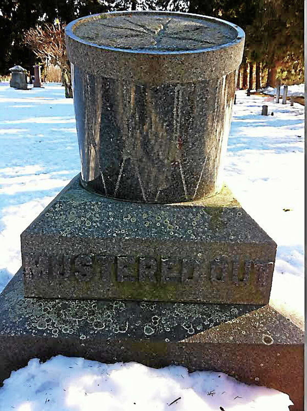This Civil War monument in Soldiers’ Lot, West Cemetery, Litchfield, is a granite drum of the type used in military bands, mounted at an angle on a granite base.