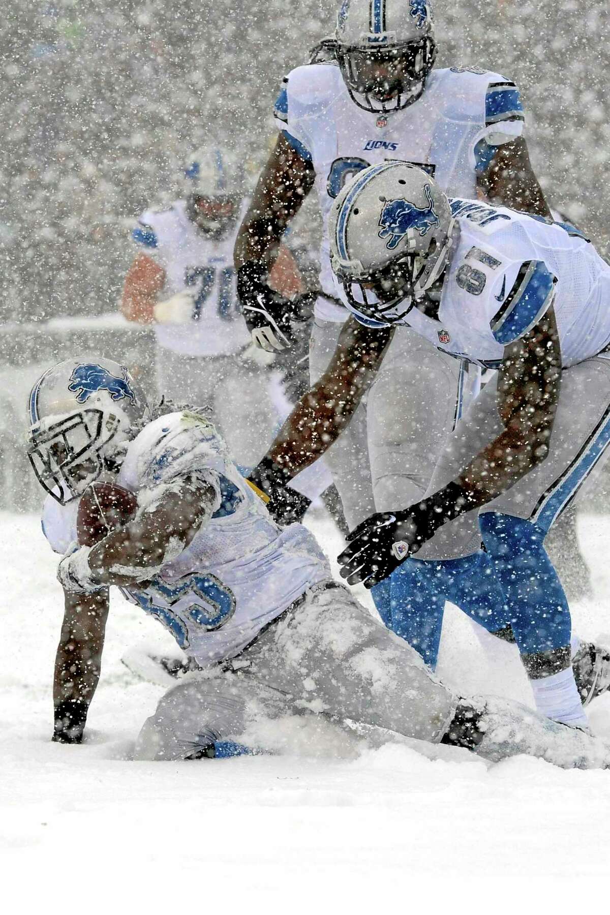 This was supposed to be Detroit Lions running back Reggie Bush scoring a touchdown to help the Register’s Dan Nowak. Instead, Bush was scratched right before kickoff and Joique Bell, left, scored this snowy touchdown against the Eagles on Sunday in Philadelphia.