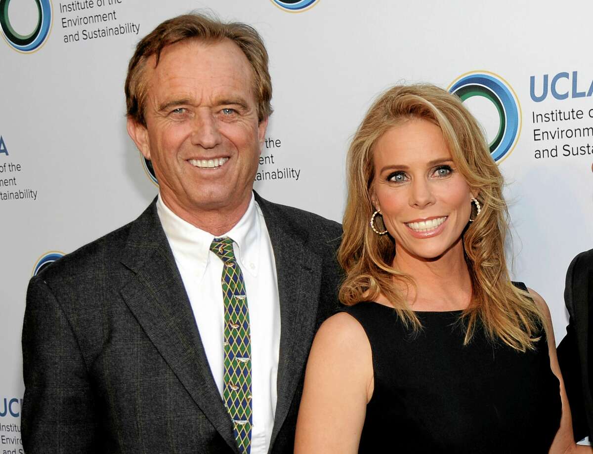 FILE - This March 21, 2014 file photo shows actress Cheryl Hines, right, posing with her fiance Robert F. Kennedy Jr., at the UCLA Institute of the Environment and Sustainability's An Evening of Environmental Excellence in Beverly Hills, Calif. Kennedy Jr. and Hines are planning to wed at the Kennedy compound on Cape Cod. Kennedy's cousin, former Rep. Patrick Kennedy, says the wedding is planned for Saturday afternoon, Aug. 2, at Ethel Kennedy's home in Hyannis Port, Mass. (Photo by Chris Pizzello/Invision/AP, File)