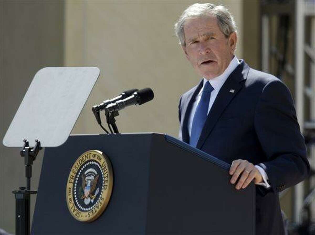 File - In this April 25, 2013 file photo, former President George W. Bush speaks during the dedication of the George W. Bush Presidential Center in Dallas. Bush has successfully undergone a heart procedure after doctors discovered a blockage in an artery. Bush spokesman Freddy Ford says a stent was inserted during a procedure Tuesday, Aug 6, 2013 at Texas Health Presbyterian Hospital in Dallas. (AP Photo/Tony Gutierrez, Pool, File)