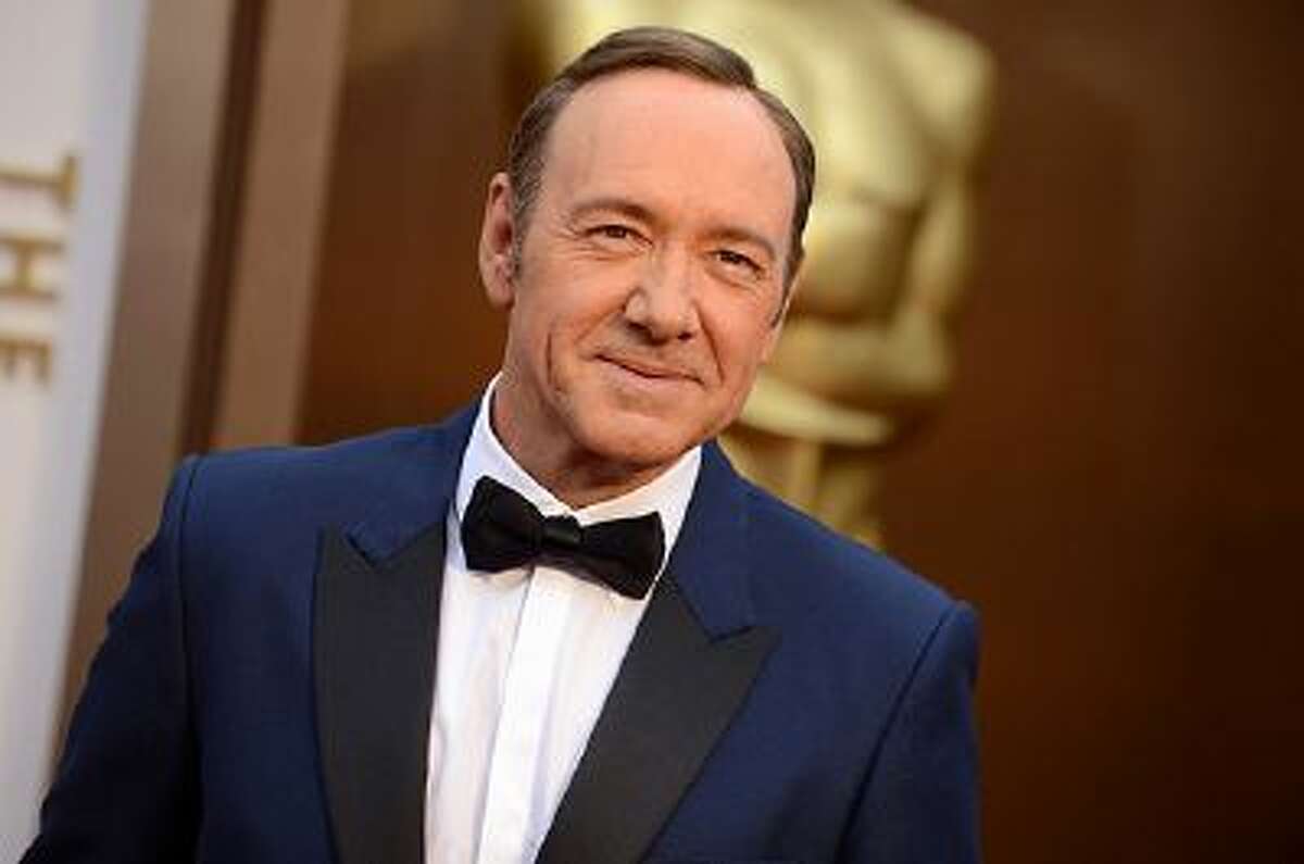 Kevin Spacey arrives at the Oscars on Sunday, March 2, 2014, at the Dolby Theatre in Los Angeles. (Photo by Jordan Strauss/Invision/AP)