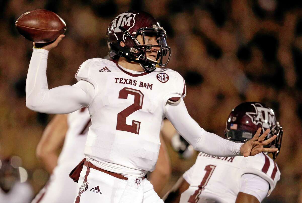 Texas A&M quarterback Johnny Manziel throws during the Aggies’ Nov. 30 game against Missouri in Columbia, Mo. Manziel is one of five finalists for the Walter Camp Player of the Year award.
