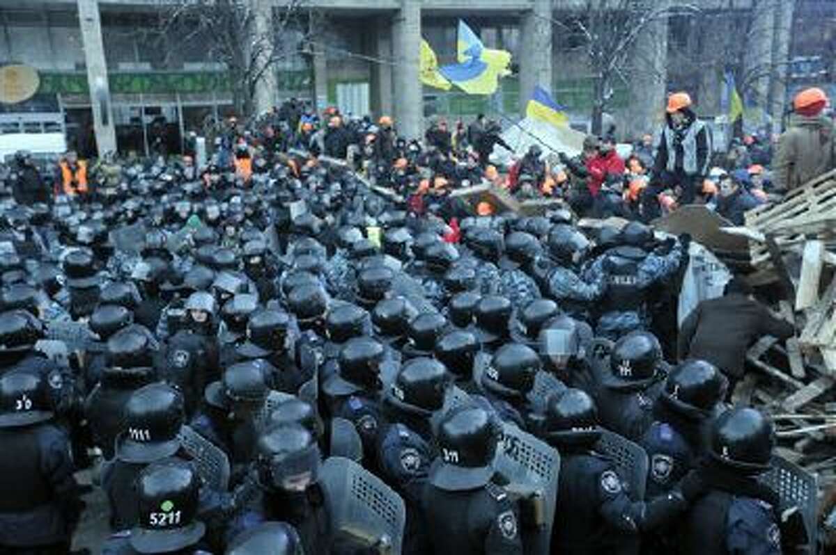 Protesters and police clash in Kiev, Ukraine, on Wednesday, Dec. 11.
