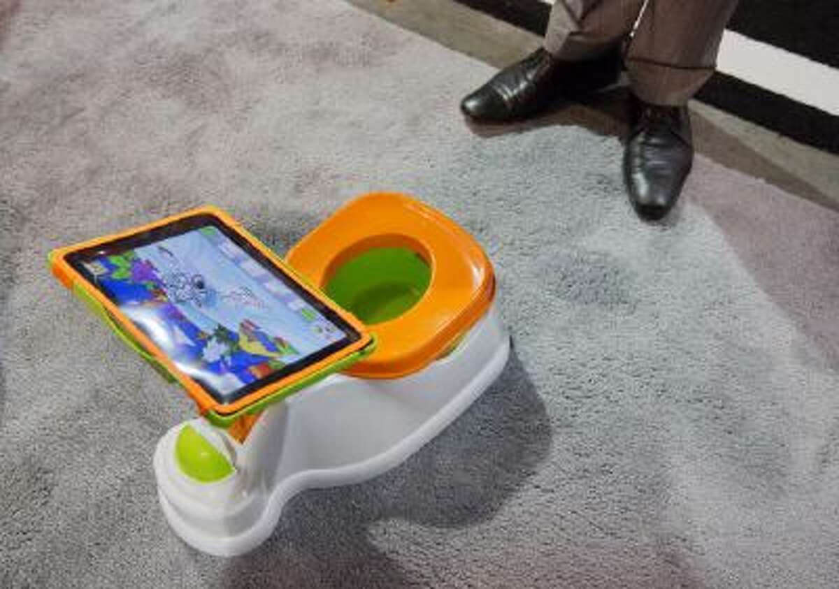 The iPotty for iPad potty training device is see on display at the Consumer Electronics Show, Wednesday, Jan. 9, 2013, in Las Vegas.