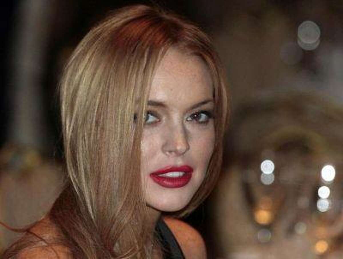 Actress Lindsay Lohan attends the White House Correspondents' Association annual dinner in Washington in this April 28, 2012 file photo. REUTERS/Larry Downing/Files