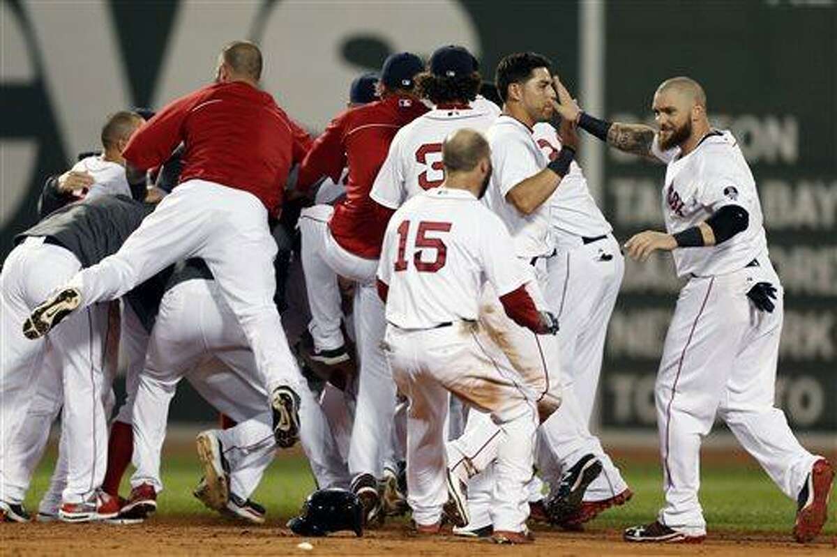 MLB: Red Sox score six runs in the bottom of the ninth to beat the Mariners