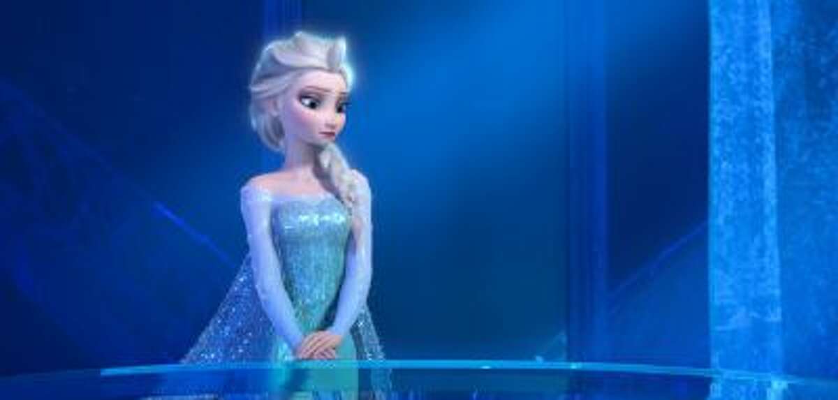 This image released by Disney shows a teenage Elsa the Snow Queen, voiced by Maia Mitchell, in a scene from the animated feature "Frozen."