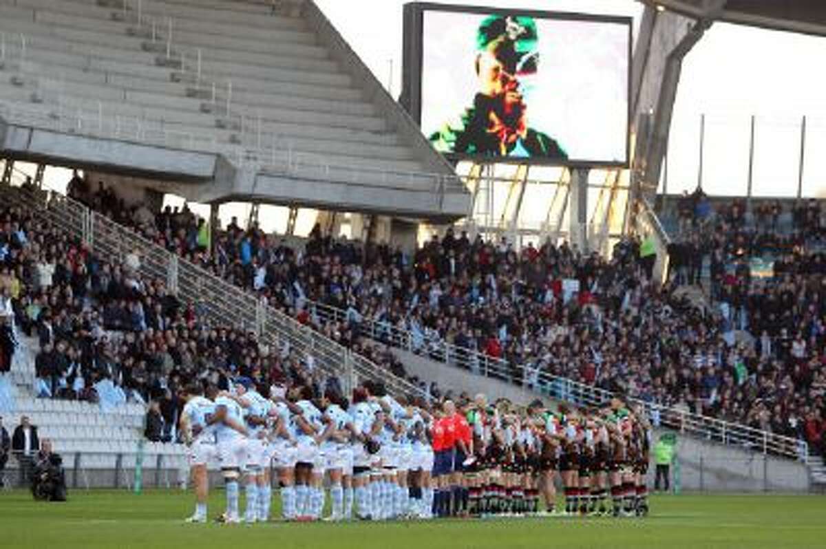 A moment of silence in honor of former South African President Nelson Mandela, who died Thursday, is observed before Paris Racing Metro 92 and Britain?s Harlequins play an Heineken Cup rugby game, Saturday, Dec. 7, 2013, at Nantes? La Beaujoire stadium, western France.