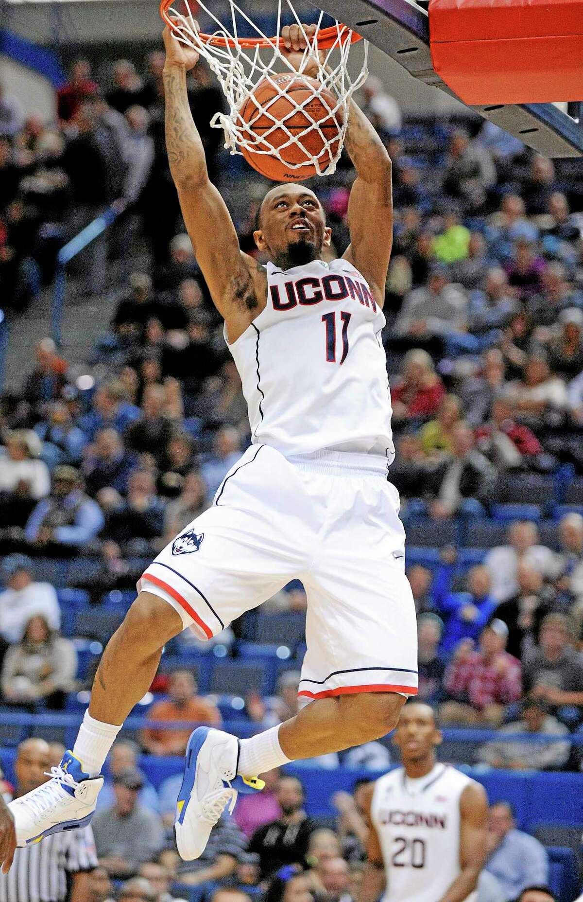 UConn’s Ryan Boatright scores two of his team-high 17 points during the first half of the 12th-ranked Huskies’ 95-68 victory over Maine on Friday night at the XL Center in Hartford.