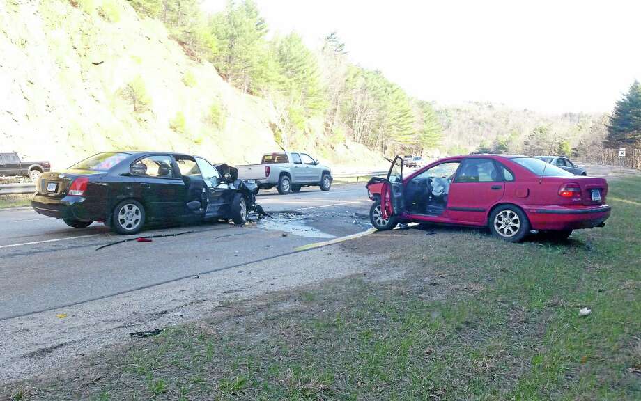Drivers walk away from crash in Harwinton after one car jumps median on
