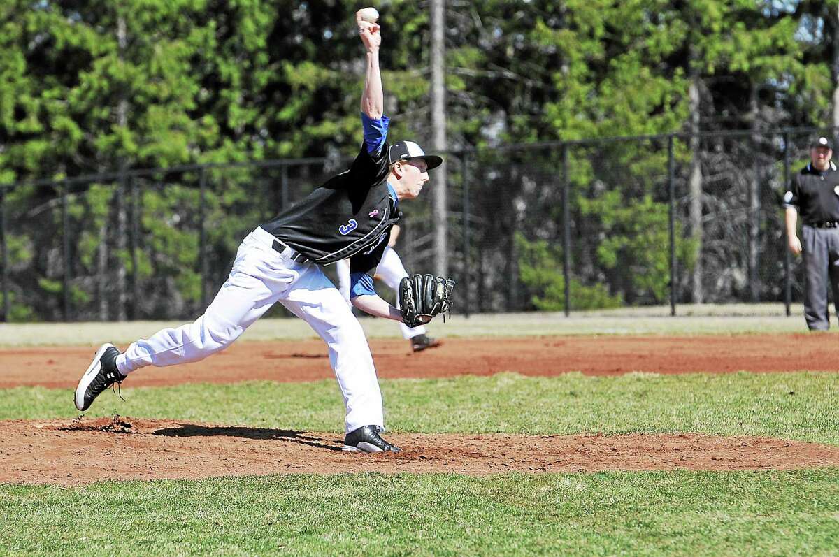St. Paul pitcher Jake Kawiecki delivers a pitch against Terryville on Saturday. The Falcons won 10-1.