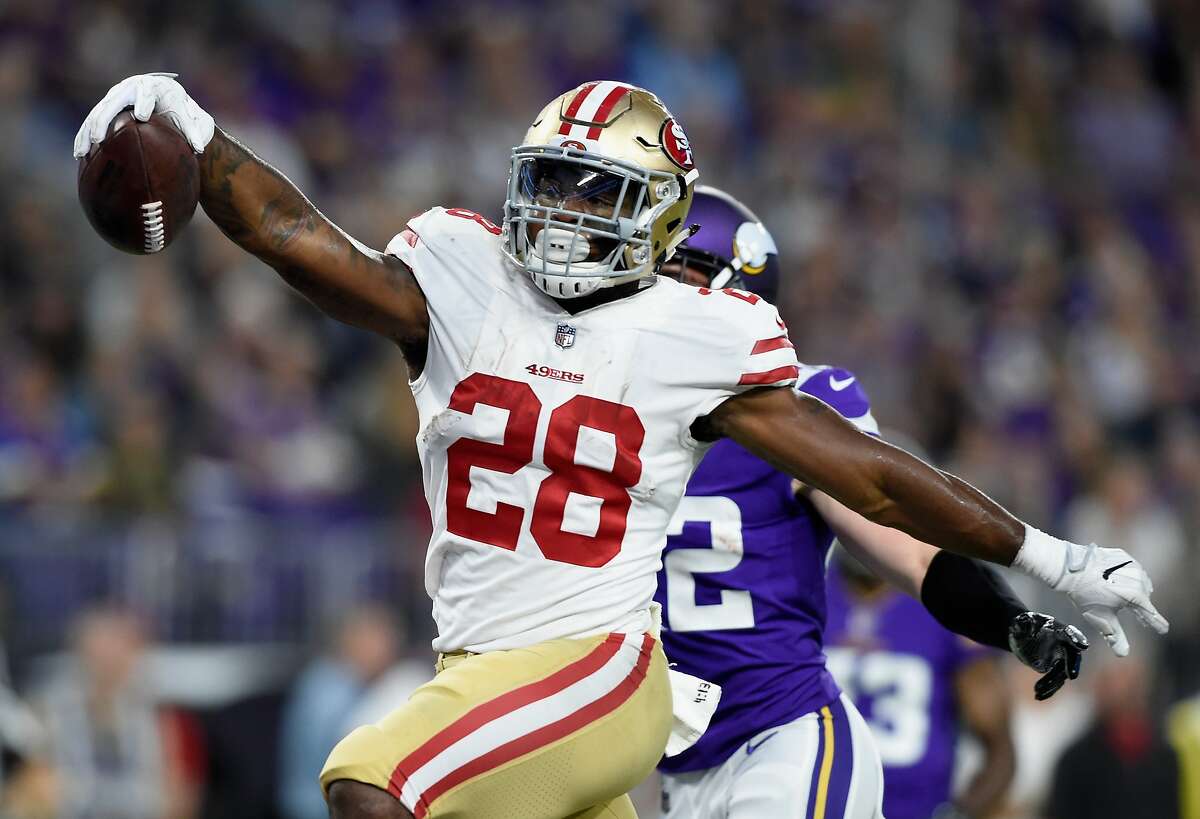 MINNEAPOLIS, MN - AUGUST 27: Carlos Hyde #28 of the San Francisco 49ers runs the ball in for a touchdown against the Minnesota Vikings during the second quarter in the preseason game on August 27, 2017 at U.S. Bank Stadium in Minneapolis, Minnesota. (Photo by Hannah Foslien/Getty Images)