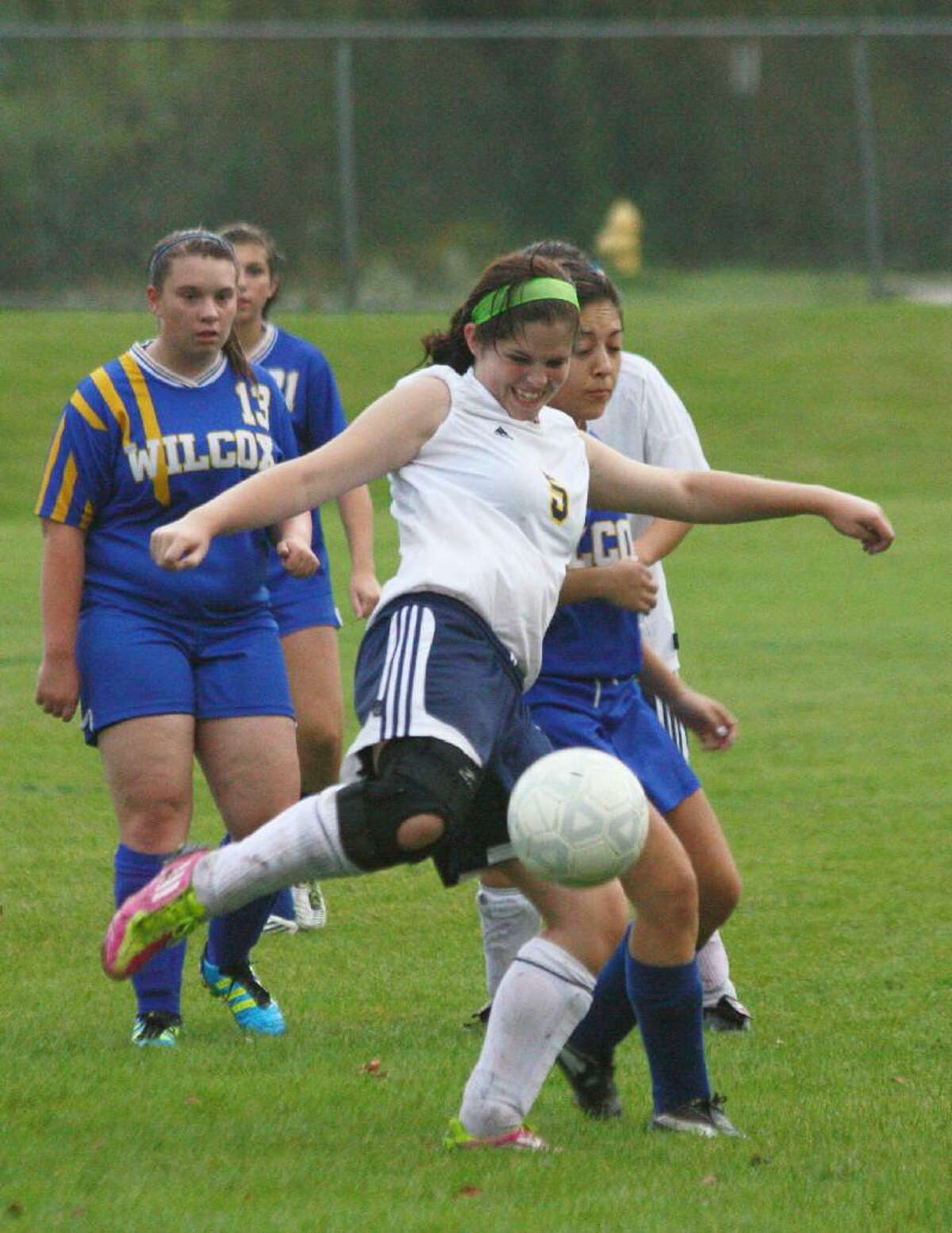 MARIANNE KILLACKEY/Register Citizen Correspondent Wolcott Tech's Melissa Pfeffer (5) looks to kick the ball during Wednesday afternoon's match against Wilcox Tech in Torrington. Wolcott Tech lost 1-0.