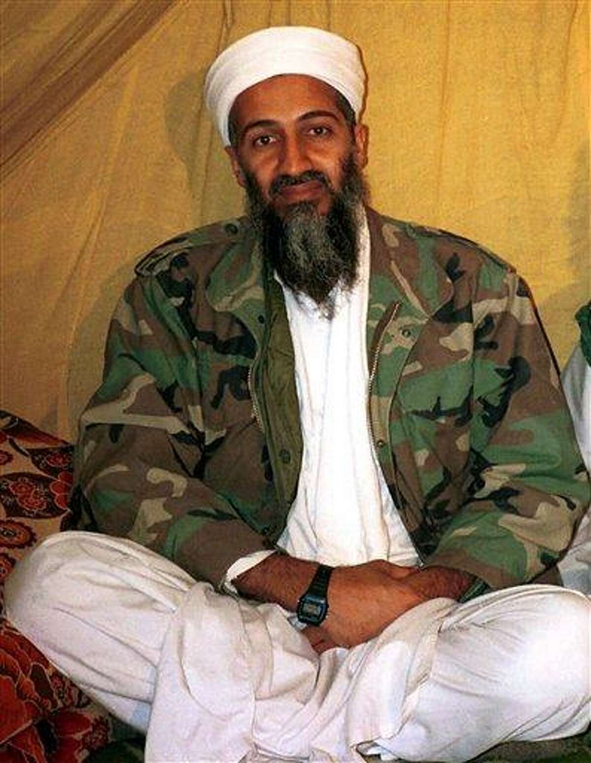 FILE -This undated file photo, shows Osama bin Laden. Americans are expected to get a glimpse of Osama bin Laden's daily life with the disclosure of home videos showing him strolling around his secret compound, along with propaganda tapes that have never been made public (AP Photo/File)