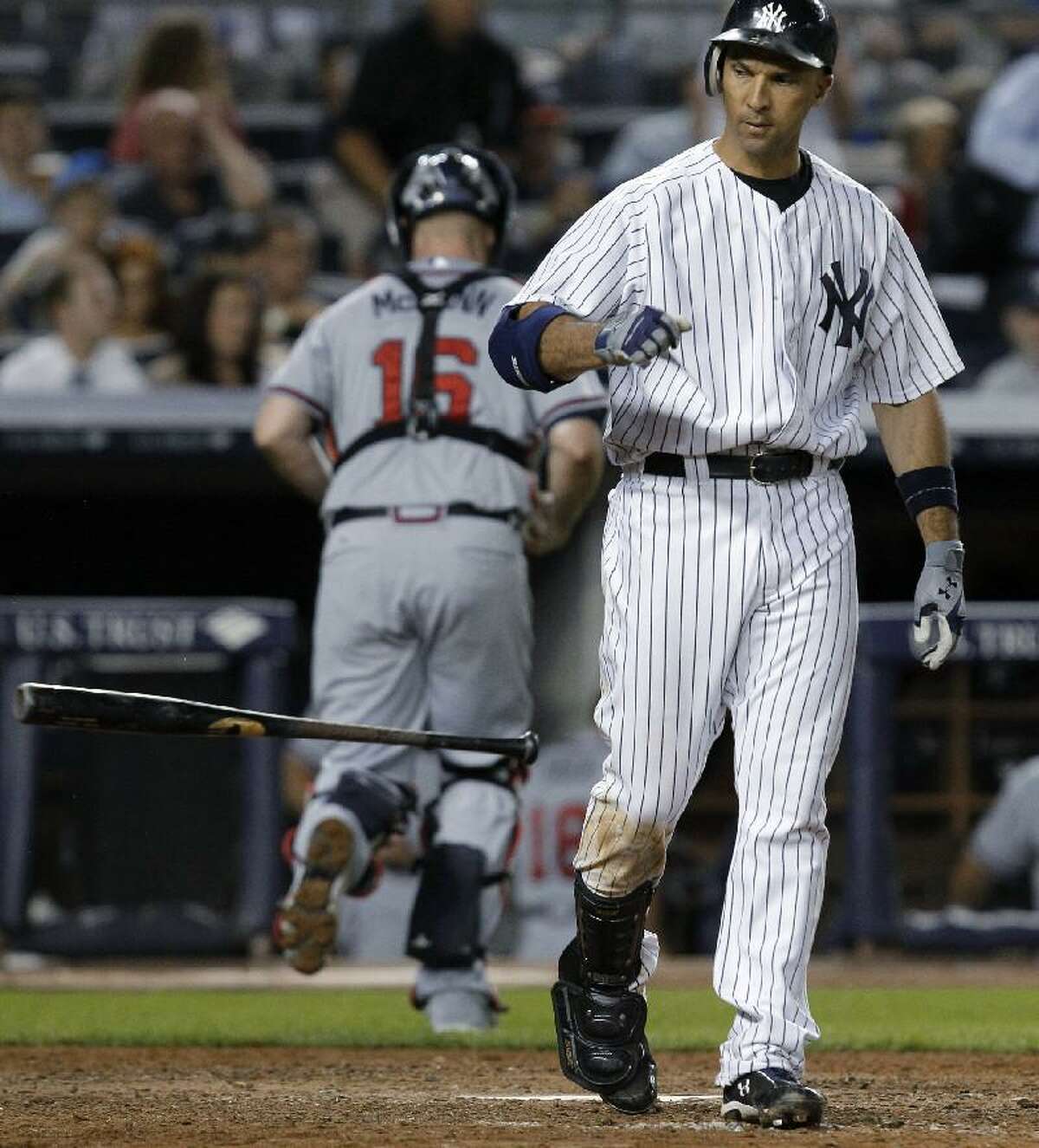 Atlanta Braves Catcher Brian McCann looks on from the dugout