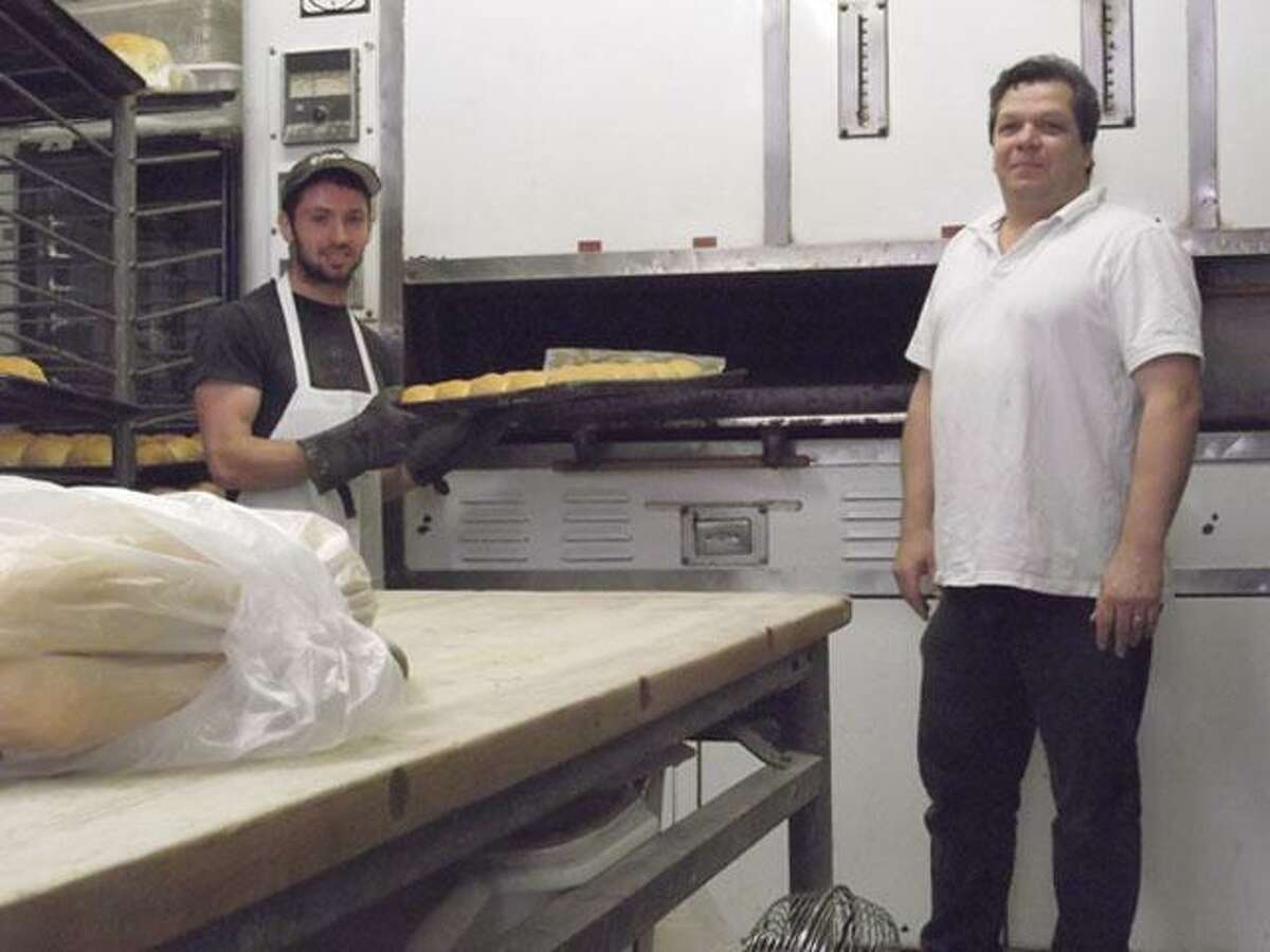 RICKY CAMPBELL/ Register CitizenFrank Madia and John Parent of The Bake Shoppe, 280 East Main St., won't continue their special bread and cookie recipes for much longer. Madia was given his layoff notice because Parent's store is unable to continue production due to slowing business.