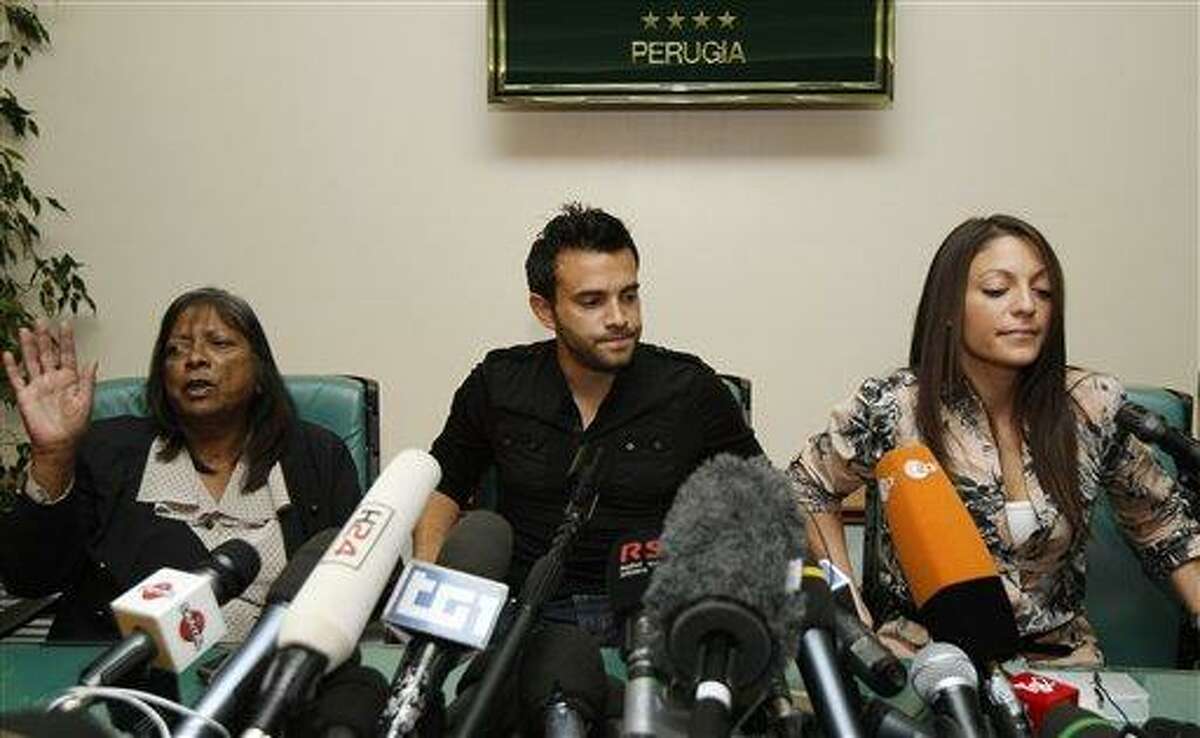 From left, Arline Kercher, Lyle Kercher and Stephanie Kercher, respectively mother, brother and sister of slain student Meredith Kercher, attend a news conference in Perugia, Italy, Tuesday, Oct. 4, 2011. The brother of slain British student Meredith Kercher says the family feels it is back to "square one" following the dramatic appeals court verdict overturning the conviction of American student Amanda Knox and her one-time Italian boyfriend. Lyle Kercher told reporters on Tuesday that the family is still trying to understand how a decision that "was so certain two years ago has been so dramatically overturned." (AP Photo/Antonio Calanni)