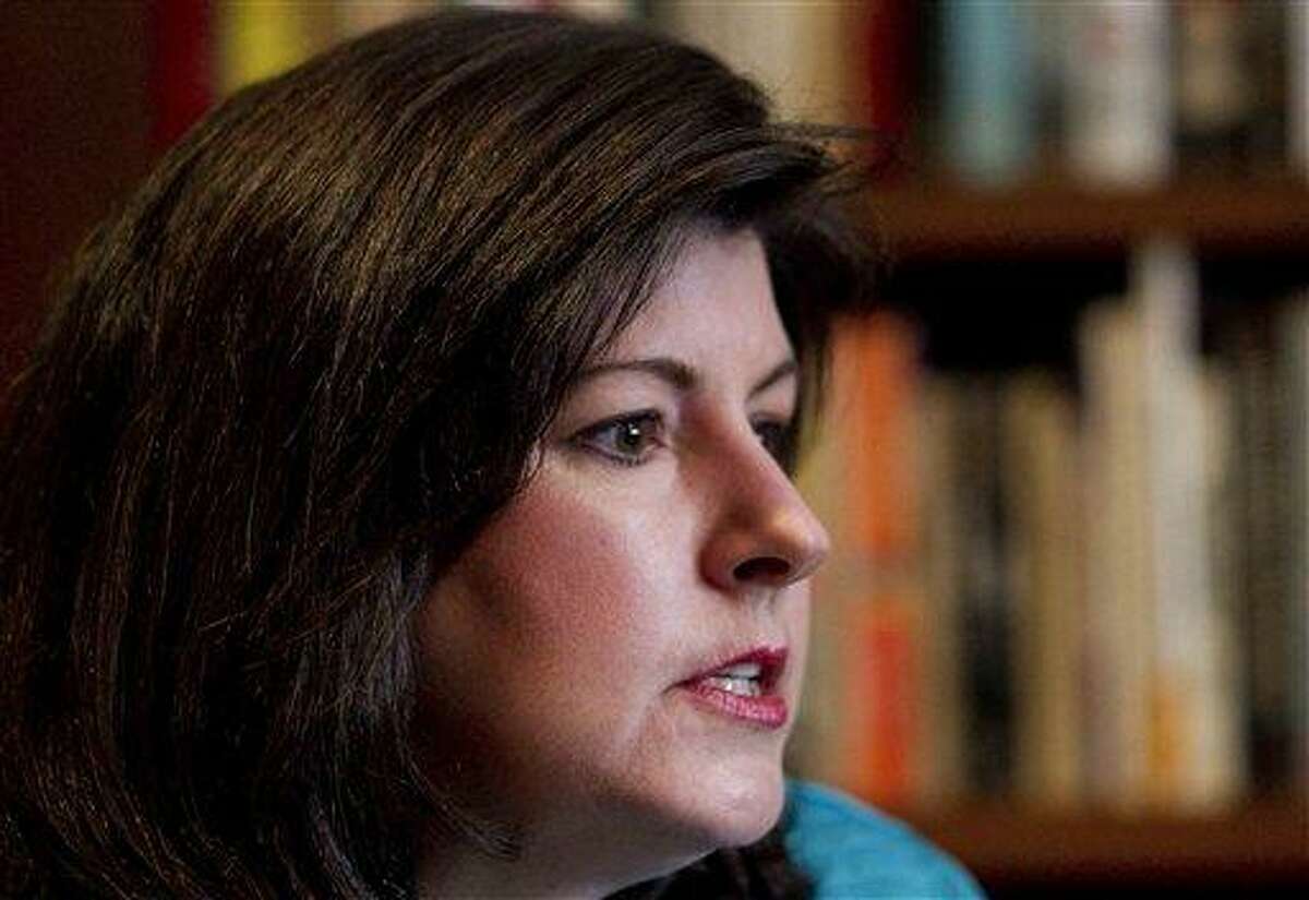 In this Feb. 7, 2012, photo, Karen Handel speaks during an interview in Atlanta. All of a sudden, abortion, contraception and gay marriage are at the center of American political discourse, with the struggling _ though improving _ economy pushed to the background. Social issues don?t usually dominate the discussion in shaky economies. Supporters of Planned Parenthood, which provides abortion services, helped force the resignation of Susan G. Komen For the Cure executive Handel after the breast cancer research group cut grants to the organization, then reversed course. Associated Press