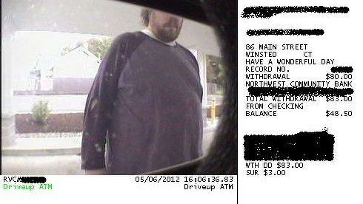 Security image of one of the suspects. This is the suspect with the larger build.