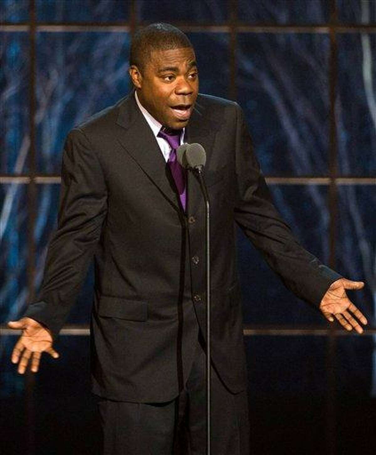 In this file photo, actor and comedian Tracy Morgan appears onstage at the ?The Comedy Awards? presented by Comedy Central in New York. Morgan says he's sorry for telling an audience that he would "pull out a knife and stab" his son for being gay. The comedian and "30 Rock" actor apologized Friday, to his fans and the gay and lesbian community for what he called "my choice of words" during his June 3 appearance at Nashville's Ryman Auditorium.