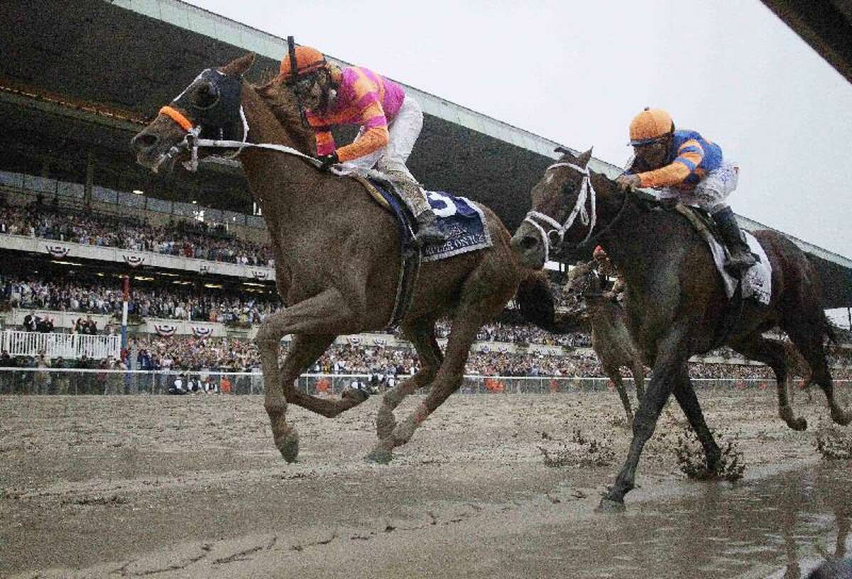 ASSOCIATED PRESS Ruler On Ice, left, with jockey Jose Valdivia Jr., sprints ahead of jockey Javier Castellano on Stay Thirsty to win the Belmont Stakes horse race Saturday at Belmont Park in Elmont, N.Y.
