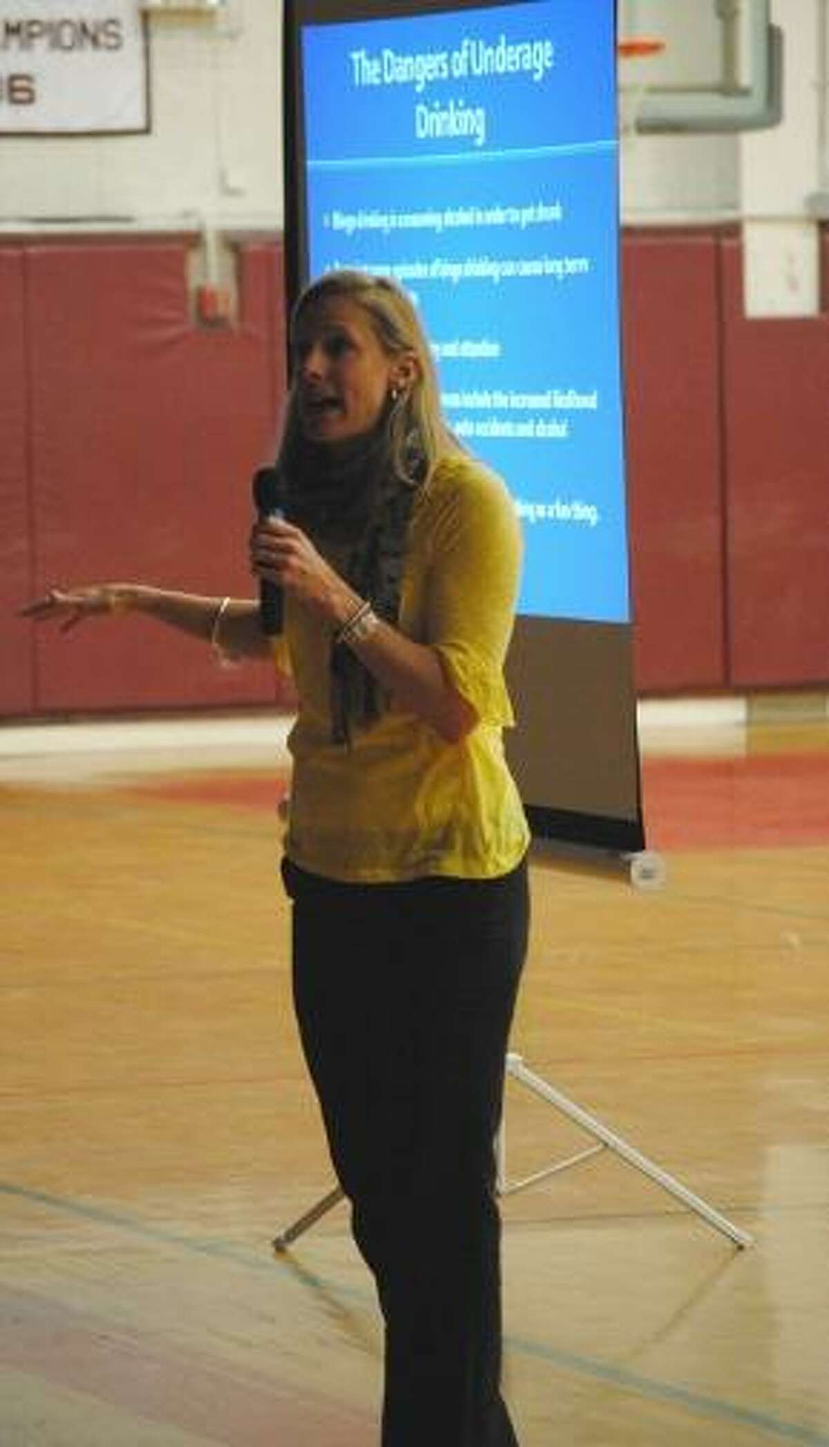 MIKE AGOGLIATI/ Register Citizen Maria Skinner of the McCall Foundation spoke to students at Torrington High School Tuesday about the dangers of underage drinking.