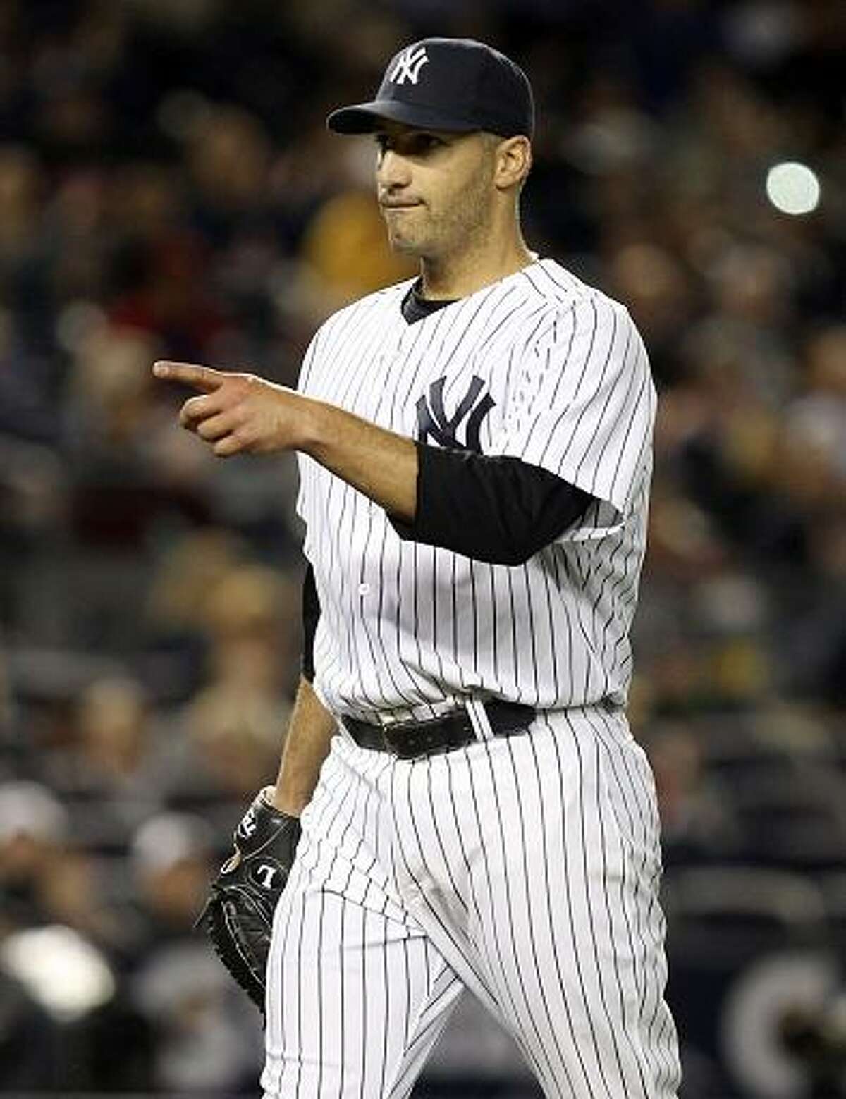New York Yankees starting pitcher Andy Pettitte reacts after finishing the top of the sixth inning of a baseball game against the Tampa Bay Rays at Yankee Stadium in New York, Tuesday, June 5, 2012. (AP Photo/Seth Wenig)