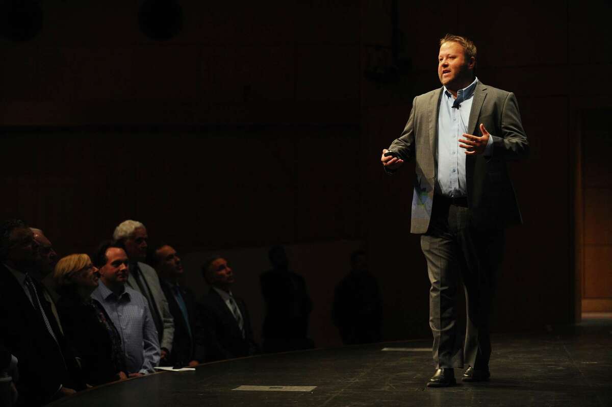 Thomas Murray, director of Innovation for Future Ready School and co-author of “Learning Transformed,” speaks to Greenwich teachers during a convocation ceremony in the Performing Arts Center of Greenwich High School in Greenwich on Monday.