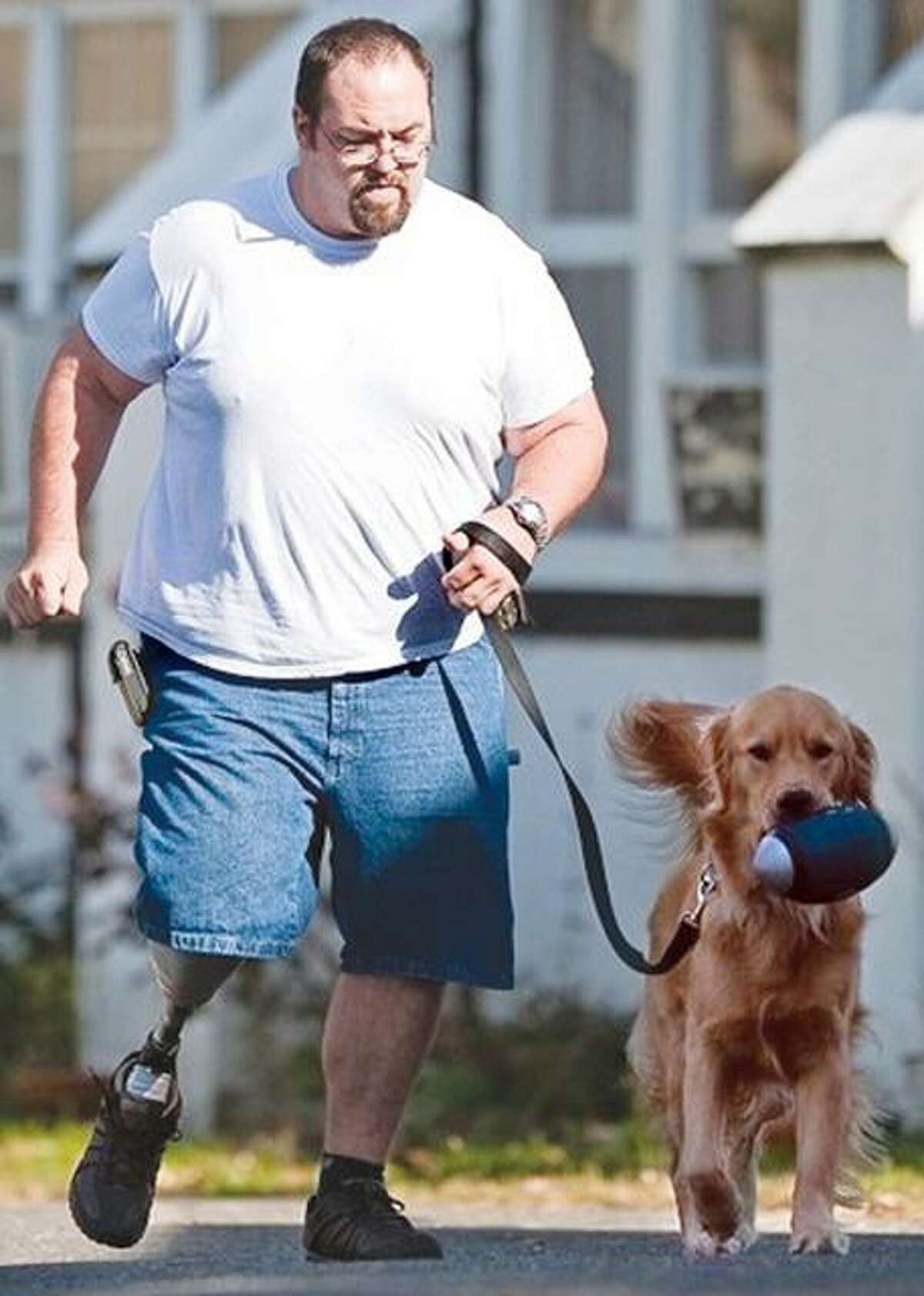 Phil Bauer is a veteran of the Iraq war. After he was seriously injured in Iraq, he returned home and suffered from post-traumatic stress disorder. He came to Project HEAL, a program for wounded warriors and part of the ECAD program. Bauer is running with his service dog, Reese.
