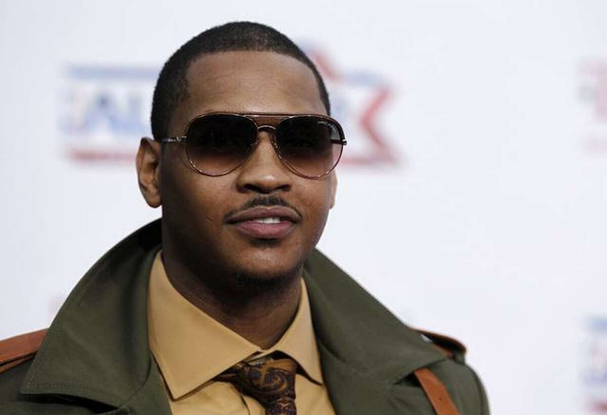 Carmelo Anthony, of the Denver Nuggets, arrives before the NBA basketball All-Star Game, Sunday, Feb. 20, 2011, in Los Angeles. (AP Photo/Matt Sayles)