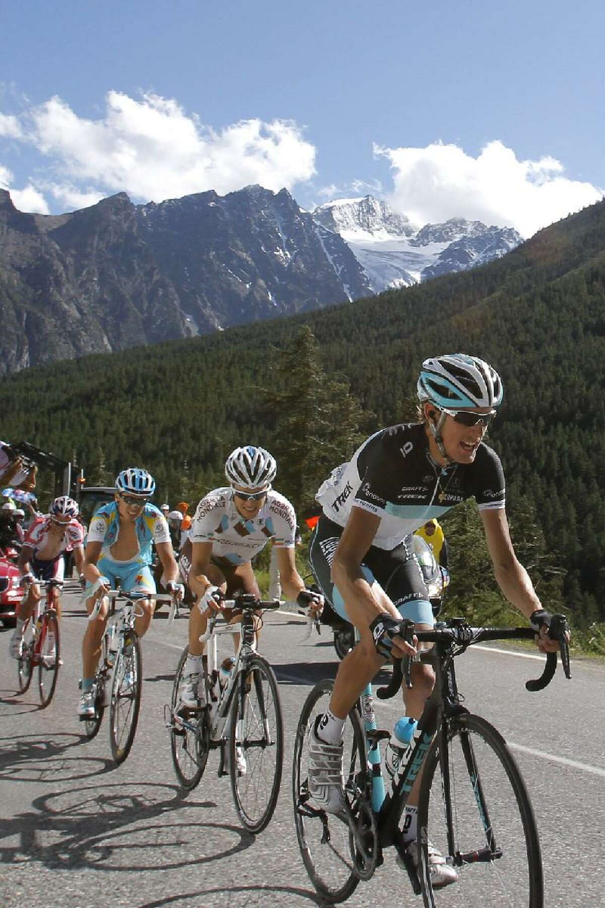 ASSOCIATED PRESS Stage winner Andy Schleck of Luxembourg, leads the breakaway group with Nicolas Roche of Ireland, second, Maxim Iglinskiy of Kazakhstan, third, and Egor Silin of Russia, rear, as they climb Lautaret pass during the 18th stage of the Tour de France cycling race over 200.5 kilometers (124.6 miles) starting in Pinerolo, Italy, and finishing on Galibier pass, Alps region, France, Thursday.